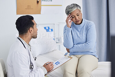 Buy stock photo Pain, headache and doctor with patient support, clipboard and healthcare exam or consultation in hospital. Tired, stress and senior woman with medical professional writing notes, helping and advice