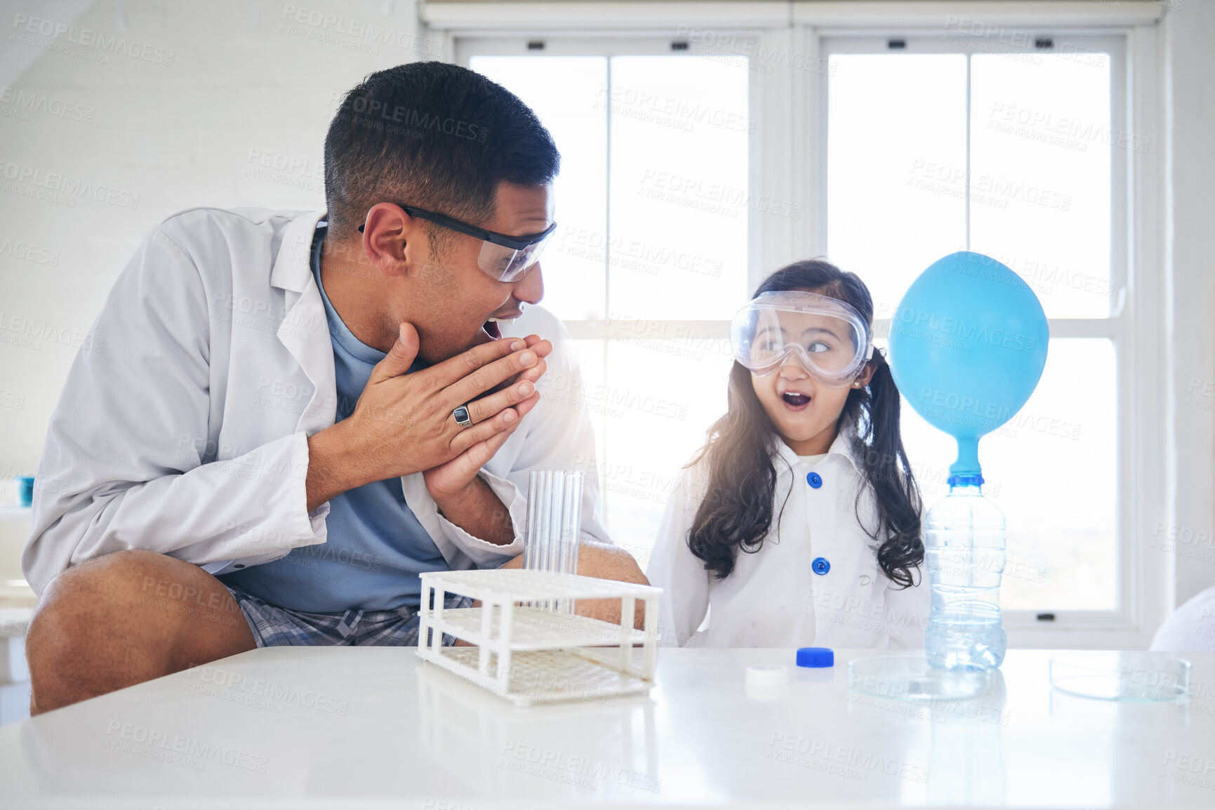 Buy stock photo Wow, education and a father and child doing science, learning innovation and lab work in a house. Happy, surprise and a young dad doing an experiment or project with a girl and studying chemistry
