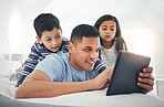 Father, children and tablet, games or cartoon streaming online with internet, bonding and people relax together in bedroom. Watch animation film, man and kids at home with connection and subscription