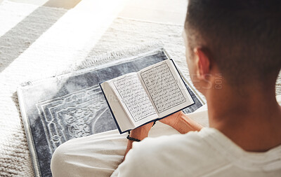Buy stock photo Prayer, muslim and Quran with man on living room floor for eid mubarak, God and worship. Islamic, hope and Ramadan with spiritual person praying on mat at home for faith, religion and gratitude