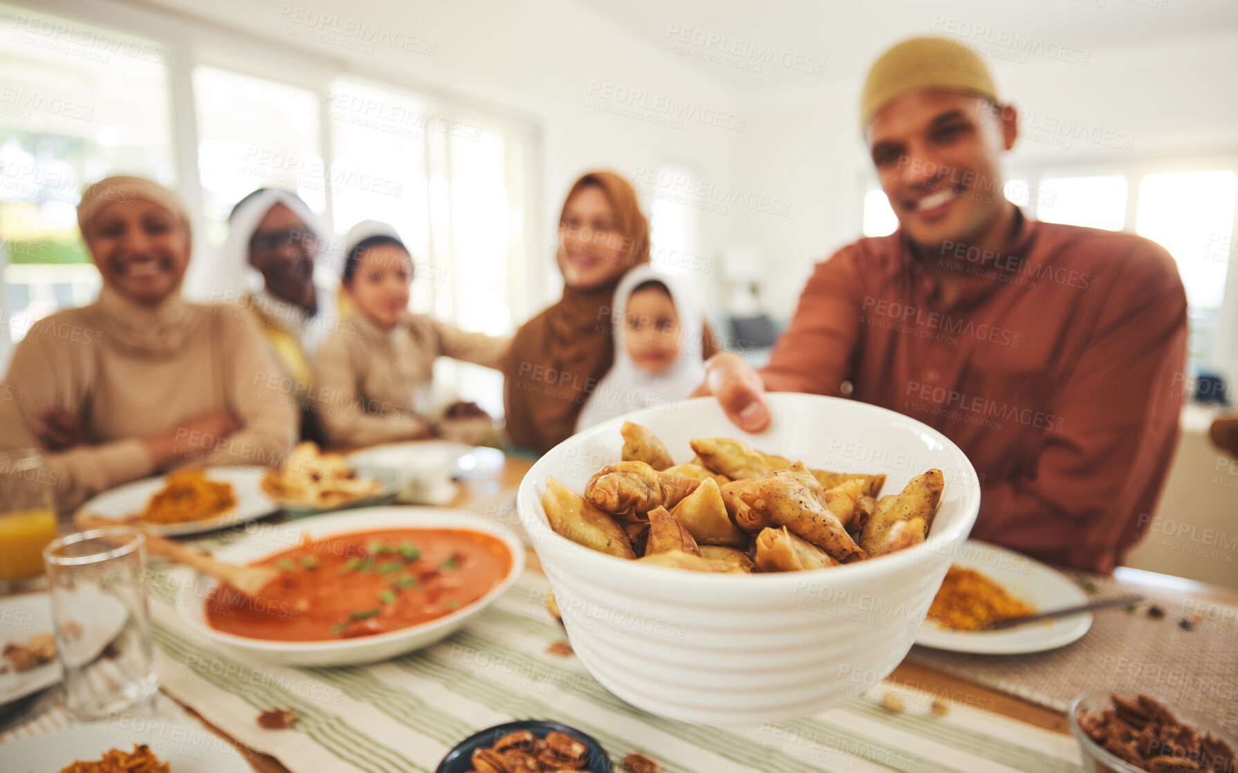 Buy stock photo Food, offer and muslim with big family at table for eid mubarak, Islamic celebration and lunch. Ramadan festival, culture and iftar with people eating at home for fasting, islam and religion holiday