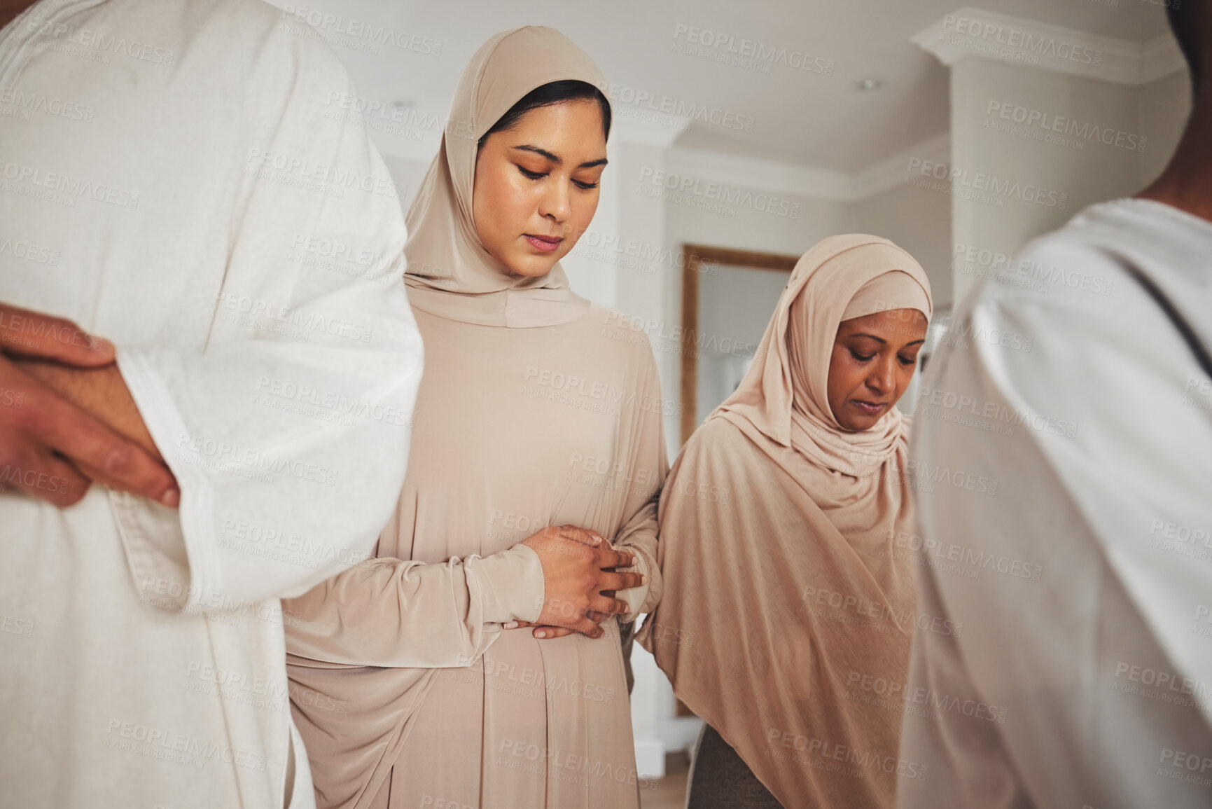 Buy stock photo Prayer, muslim and islamic with women in living room for eid mubarak, God and worship. Quran, hope and Ramadan with spiritual family praying dua at home for faith, religion and gratitude