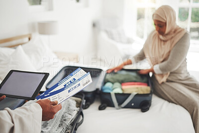 Buy stock photo Travel, ticket and Muslim couple with suitcase packing for holiday, vacation and religious trip. Home, luggage and man and woman with boarding pass in bedroom for journey, adventure and tourism
