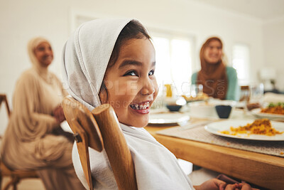 Buy stock photo Food, muslim and child with big family at table for eid mubarak, Islamic celebration and lunch. Ramadan festival, culture and iftar with people eating at home for fasting, islam and religion holiday