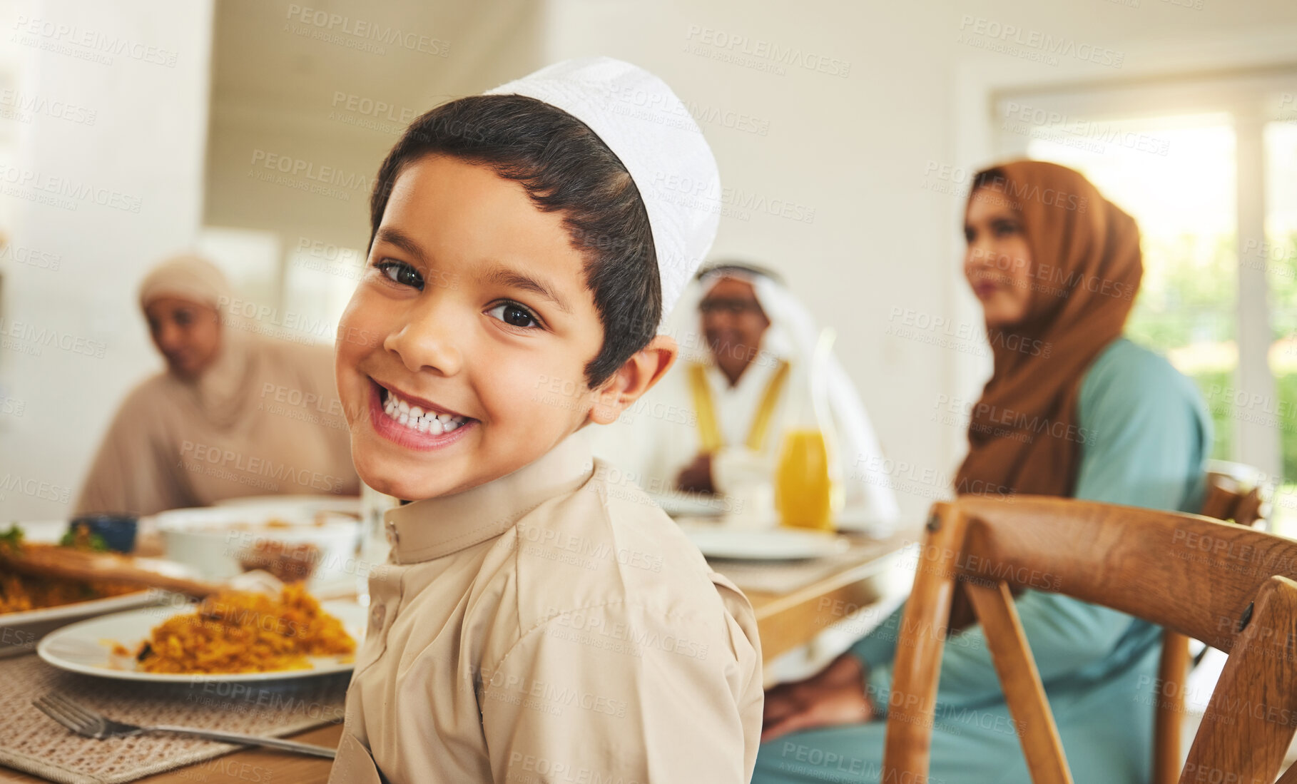 Buy stock photo Food, portrait and child with big family and muslim holiday for eid mubarak, Islamic celebration and lunch. Ramadan festival, culture and iftar with people at home for fasting, islam and religion