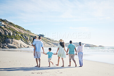 Buy stock photo Beach, holding hands and grandparents, parents and kids for bonding, quality time and relax in nature. Family, travel and mom, dad and children walking by ocean on holiday, vacation and adventure
