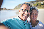 Senior couple, beach selfie and portrait with smile, pouting lips and happy for vacation, summer and memory. Mature man, woman and outdoor with photography, profile picture and ocean for social media