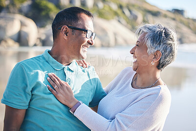 Buy stock photo Beach, travel and senior couple laughing for bonding, quality time and relaxing in nature. Love, retirement and happy elderly man and woman by ocean on holiday, vacation and adventure in morning