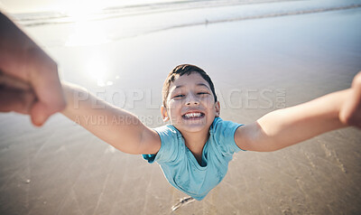 Buy stock photo Person, spin kid and pov at beach, portrait and smile for game, excited and playing by water in sunshine. Parent, young boy child and swing with speed, love and bonding with holding hands by ocean