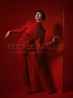 Buy stock photo Fashion, art and makeup, woman with red board, futuristic cosmetics and unique studio background. Future aesthetic, retro culture and creative beauty, body of model in luxury designer brand clothes.