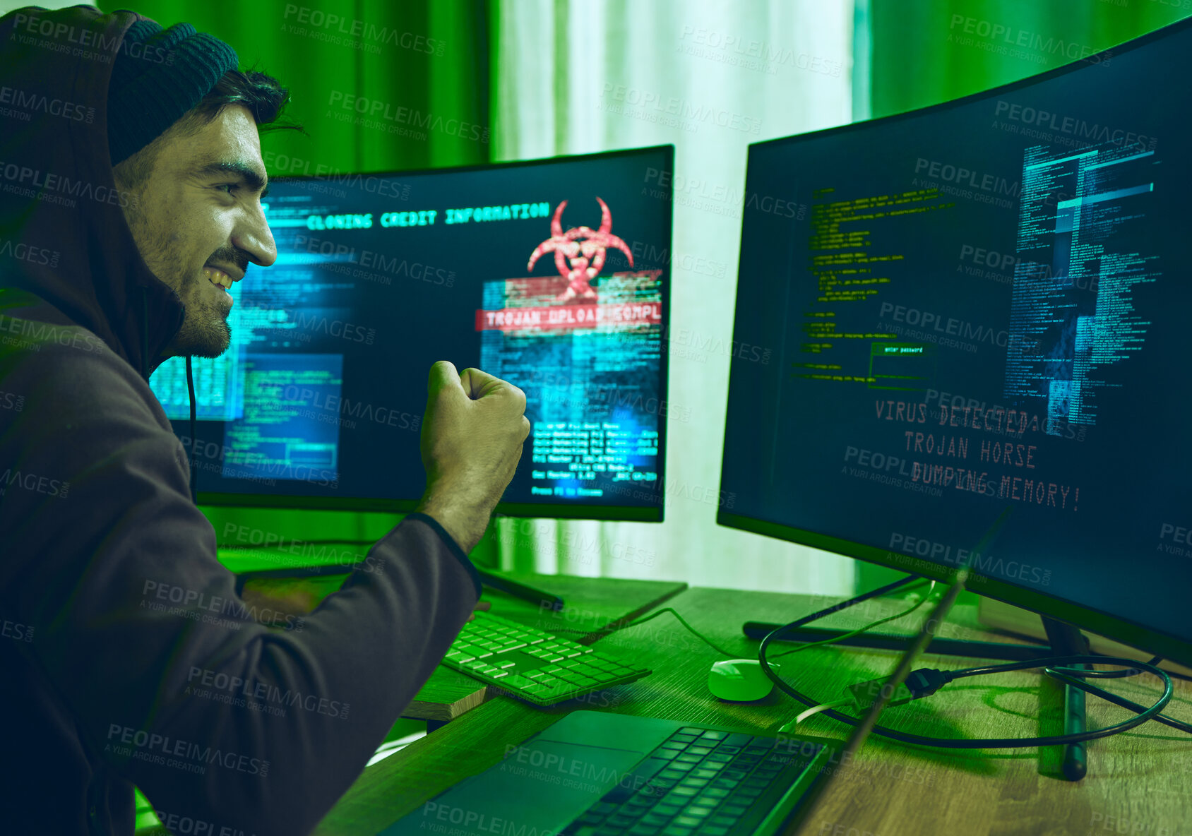 Buy stock photo Cybersecurity, crime and happy man programming in neon office with code, fraud and hacking with hoodie. Software, ransomware and hacker on cyber attack, password thief coding online scam and success.