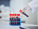 Science, blood and hands with test tube in laboratory for research, medical process and healthcare analysis. Closeup, scientist and bottle with red sample for dna experiment, rna and genetics results