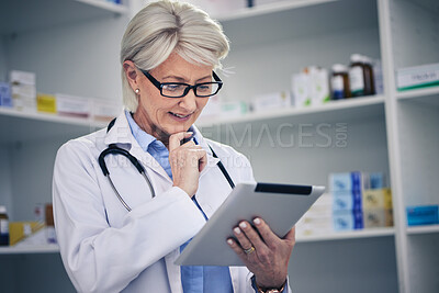 Buy stock photo Senior woman, pharmacist and tablet reading with medical stock and digital telehealth work. Pharmacy, healthcare store and pills with elderly female employee with a smile with research information 