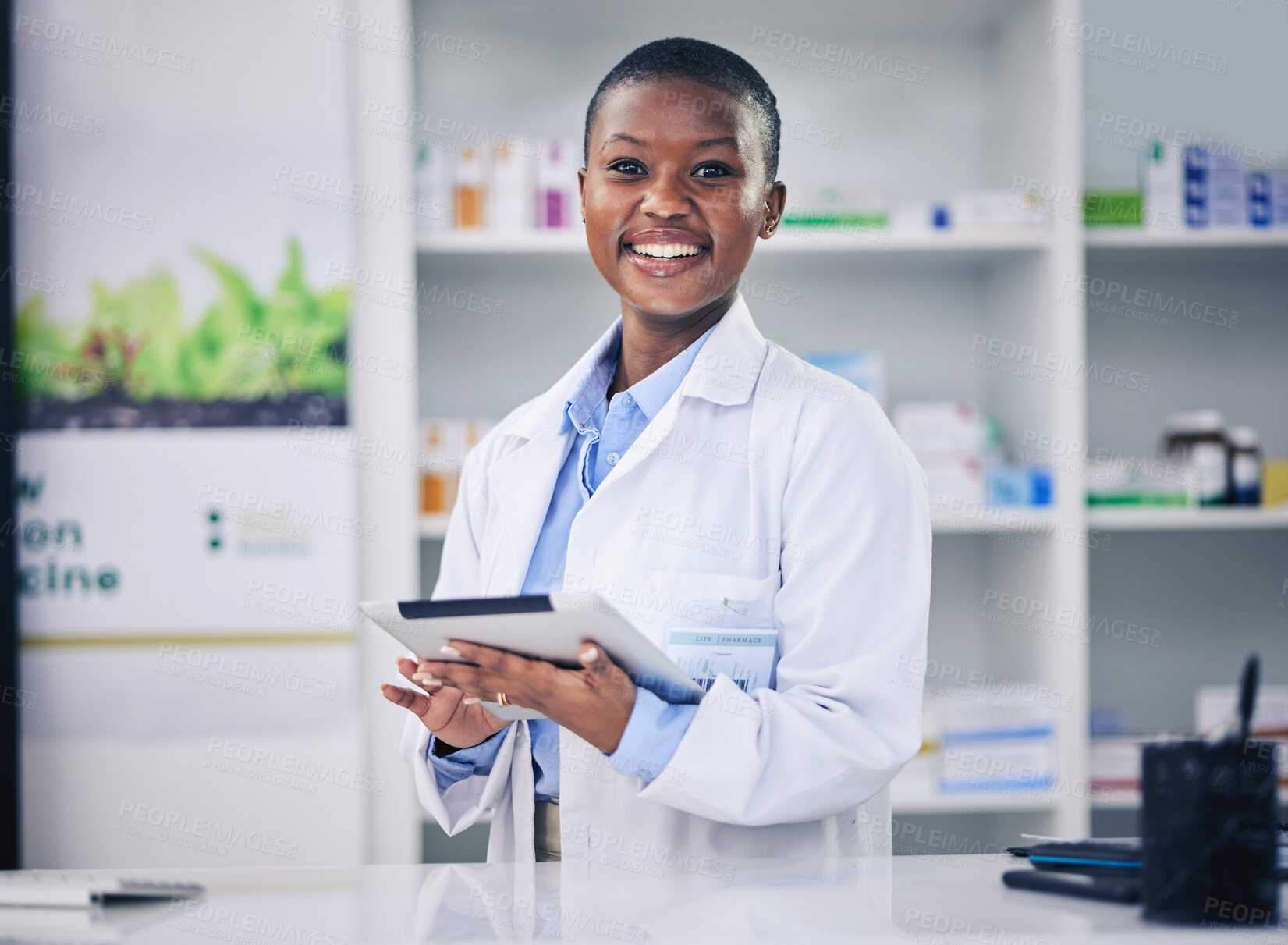 Buy stock photo Pharmacy, tablet and black woman with checklist at counter for medicine, information and advice on drugs. Digital list, pharmacist or medical professional with online inventory for telehealth in shop