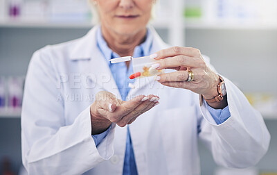 Pharmacist, hands and pills in pharmacy or closeup with medicine support or cure. Prescription, capsules and health care profession at drug store for treatment for correct dose or medical treatment.