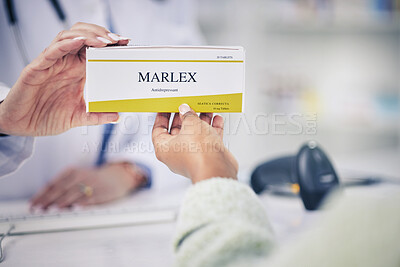 Buy stock photo Woman, pharmacist and hands with box of pills for medication, cure or prescription on counter at pharmacy. Closeup of female person or doctor giving tablets or antibiotics for depression at drugstore