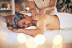 Senior man, sleeping and relax for back massage, spa treatment or body care in physical therapy at resort. Calm elderly male person relaxing or asleep on salon bed for zen, stress relief or getaway