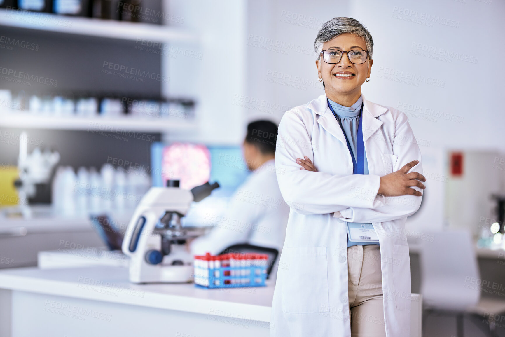 Buy stock photo Portrait, research and senior woman with arms crossed, medical and success with lab equipment, smile and development. Female person, confident and healthcare professional with science and innovation