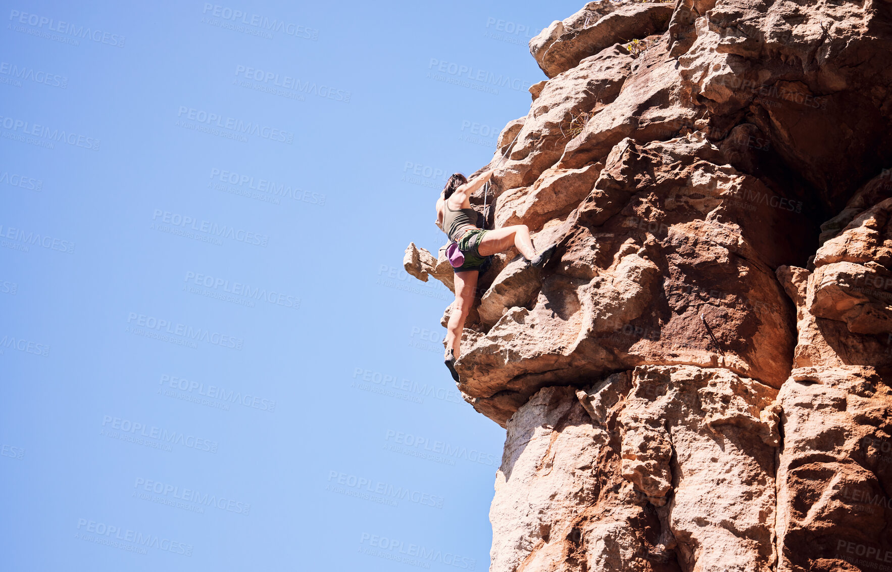 Buy stock photo Fitness, rock climbing and space with woman on mountain for sports, adventure and challenge. Fearless, workout and hiking with person on training cliff for travel, freedom and exercise mockup