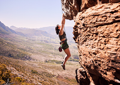 Buy stock photo Sports, rock climbing and training with woman on mountain for fitness, adventure and challenge. Rope, workout and health with person on cliff in nature for travel, freedom and exercise mockup