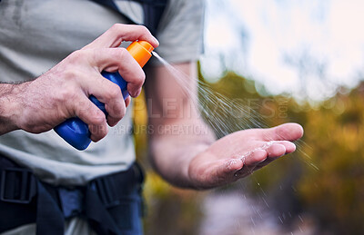 Buy stock photo Sunscreen spray, hand and closeup while hiking for security from the sun and health in summer. Exercise, nature and a man with a bottle with cream for skincare and safety from sunshine for fitness
