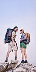 Mountain, hiking and portrait of man with woman on peak for adventure in nature, landscape and travel. Outdoor trekking, happy couple on cliff and relax in clouds for natural journey with backpack.