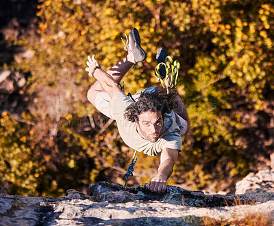Buy stock photo Rock climbing, explore and mountains with man in nature for sports, fitness and adventure. Workout, exercise and travel with person training on cliff for rope, challenge and performance