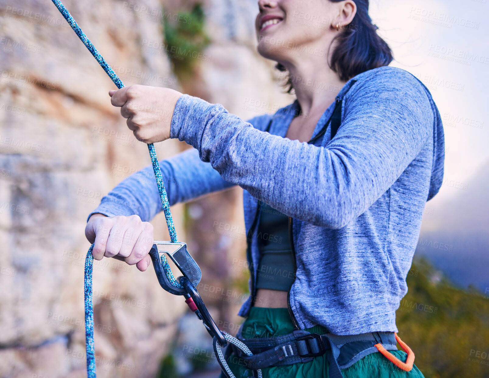 Buy stock photo Mountain, happy and woman with rope for rock climbing adventure, freedom and extreme sports in nature. Fitness, safety and female person with equipment or gear for training, activity and challenge