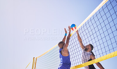 Beach, volleyball and men jumping at net with sports action, fun and summer competition with blue sky. Energy, ocean games and volley challenge with team hitting ball for goal at match in nature.