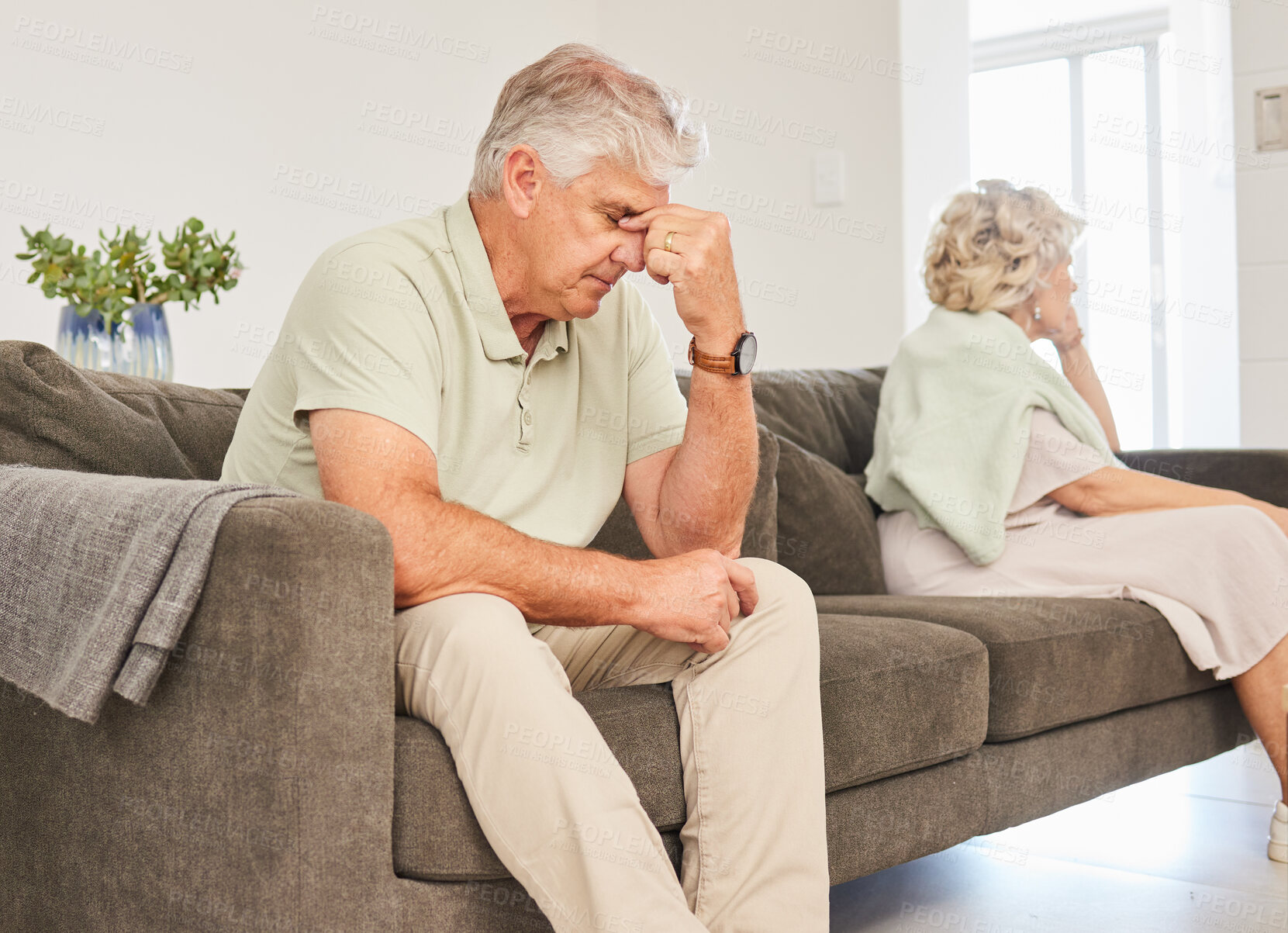 Buy stock photo Angry, senior man and fight on sofa in divorce, breakup and stress of sad separation at home. Argue, depression and frustrated couple on couch in conflict, crisis and problem of drama in bad marriage