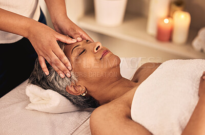 Woman, face and head massage at spa with beauty therapist, skincare treatment and healing at cosmetics salon. Calm, relax and mature female client at wellness resort for reiki and facial acupressure