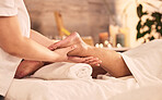 Closeup, foot and relax for massage at spa in acupressure treatment, holistic therapy or healing detox. Hands, feet or pedicure service for muscle reflexology, circulation or skincare at beauty salon