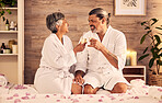 Spa, wine glasses and happy couple cheers for massage, vacation or holiday celebration with love and romance. Champagne of senior people for luxury, wellness and relax in hospitality service or hotel