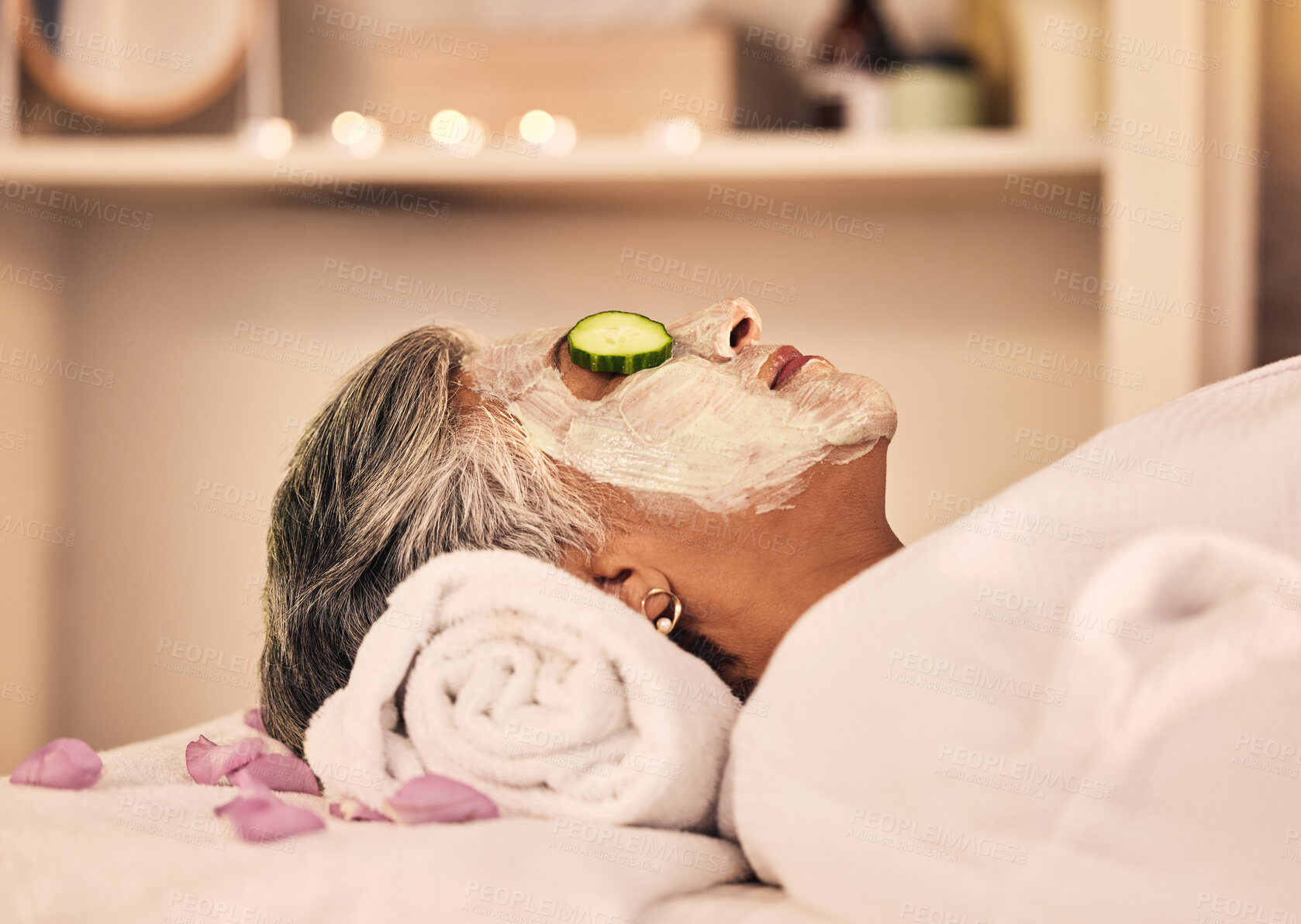 Buy stock photo Woman, spa and relax with face mask, cucumber and skincare treatment at beauty salon. Calm mature female client cooling eyes at wellness resort with facial cleaning, hydration glow or cream cosmetics