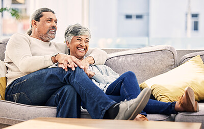 Buy stock photo Senior couple on couch, laughing and watching tv at home, bonding and love with marriage and time together. Happiness, people relax in lounge and streaming comedy movie, retirement and life partner