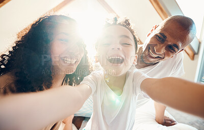 Buy stock photo Funny, family and face selfie in home, bonding and laughing together with lens flare. Portrait, happy and girl with father, mother and parents taking profile picture for memory, social media and love