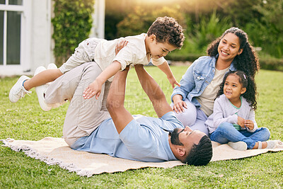 Buy stock photo Picnic, airplane and happy family relax, play or enjoy outdoor quality time together, flying games and nature fun. Summer freedom, backyard and bonding dad, mom and kids imagine plane flight in park