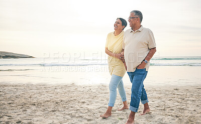 Buy stock photo Love, walking and senior couple at the beach happy, relax and bond in nature together. Ocean, embrace and old people at the sea for travel, vacation and enjoy retirement with holiday, freedom or walk