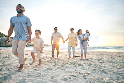 Buy stock photo Family, generations and holding hands on the beach, travel and tropical vacation with solidarity and support. People outdoor, grandparents and parents with young kids, adventure and smile in nature