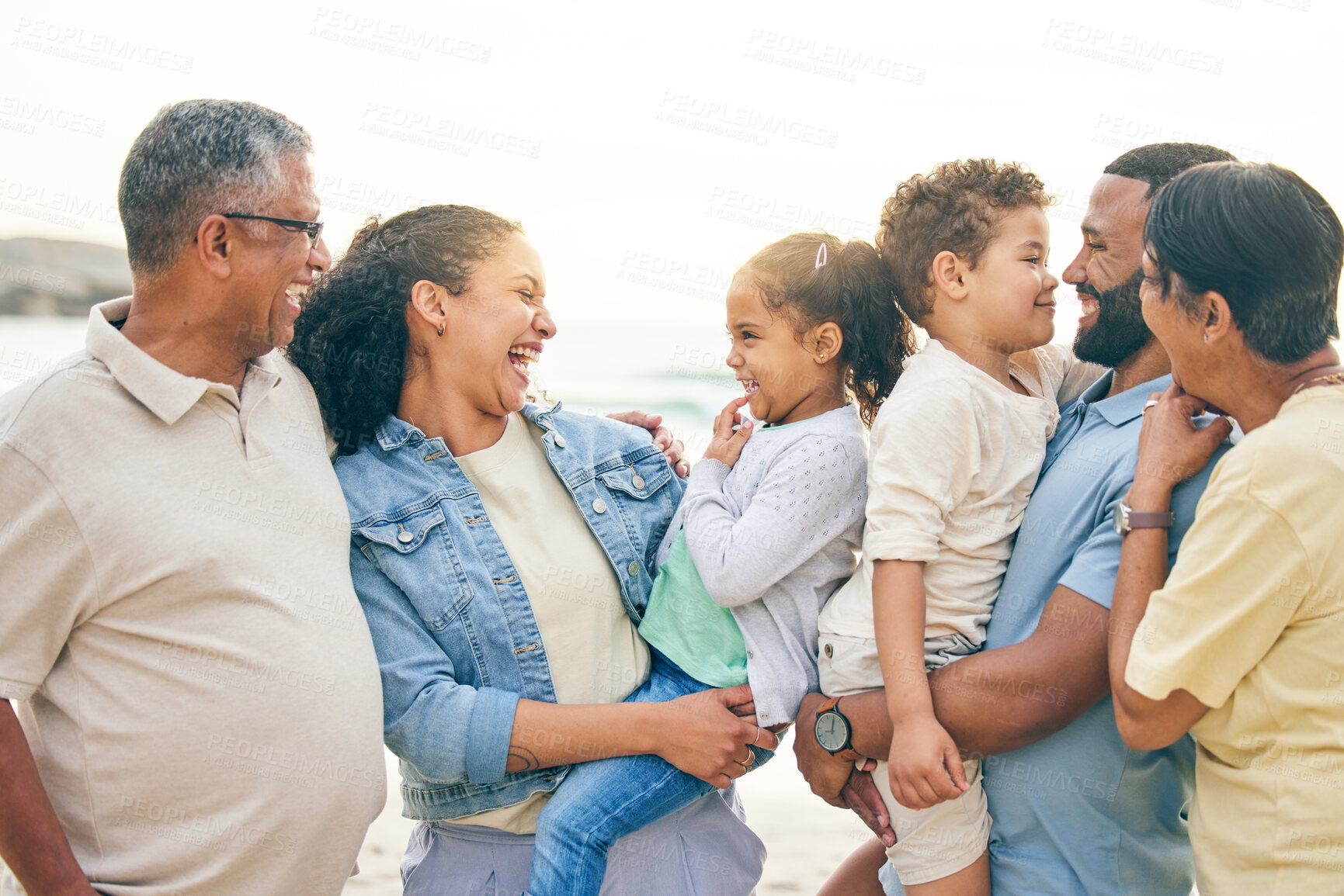 Buy stock photo Happy, big family and beach vacation in nature bonding, laugh and relax outdoor together. Smile, love and children with parents and grandparents at the sea for having fun, trip or holiday in Cancun