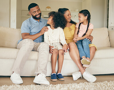 Buy stock photo Parents, kids and relax on sofa of home for love, care and happy quality time together in living room. Mother, father and young children smile in support, trust and freedom of bonding in family house
