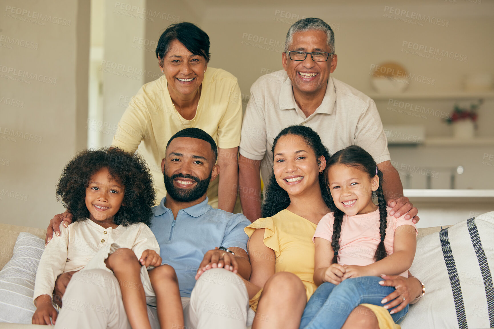 Buy stock photo Parents, kids and portrait of big family in home for love, care and quality time together. Mother, father and grandparents relax with young children in living room for support, smile and generations