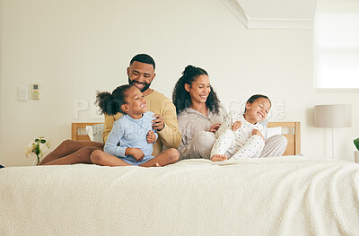 Buy stock photo Family, fun and children in morning in bedroom for happiness in home for bonding with love. Playful, mother and father with kid together on bed for laughter for quality time with care with youth.
