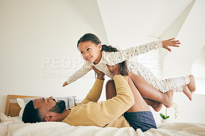 Buy stock photo Family, airplane and father with girl child on a bed for playing, bond and relax in their home together. Flying, play and happy kid with parent in a bedroom with vacation freedom, wake up and smile
