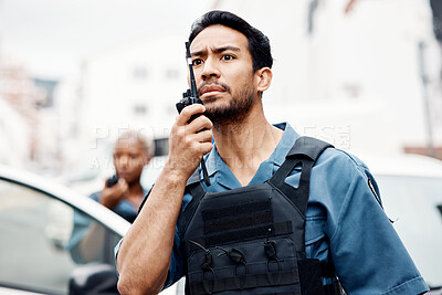 Buy stock photo Asian man, police and walkie talkie for backup in city communication, reinforcement or emergency. African female person, security guard or cop radio calling team for crime in street of an urban town