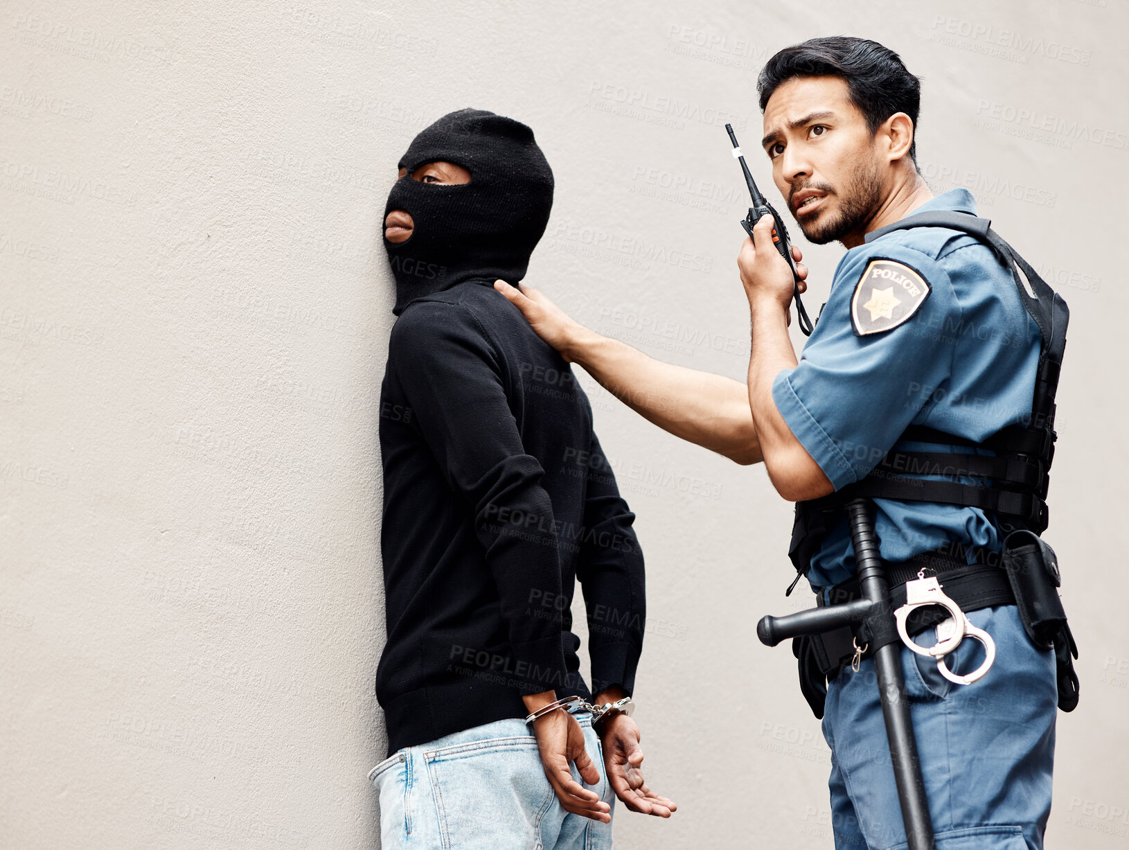 Buy stock photo Man, police and walkie talkie with criminal for arrest, crime or justice in theft, robbery or violence. Male person, officer or security guard with handcuffs and force on suspect and calling backup
