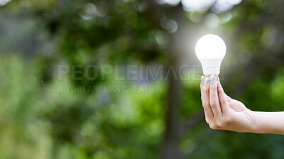Buy stock photo Nature, hand and lightbulb for solar energy, idea or sustainability with lighting. Creative, innovation and person with bulb for eco friendly electricity, green solution or inspiration with mockup