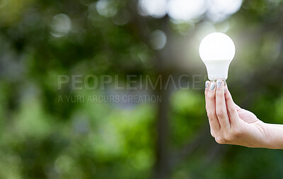 Buy stock photo Nature, hand and lightbulb for knowledge, energy or sustainability with solar power. Creative, innovation and person with bulb for eco friendly electricity, green solution or inspiration with mockup