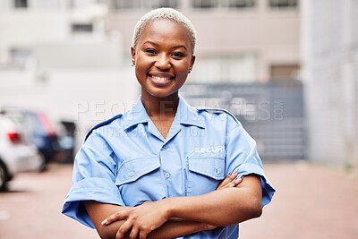 Buy stock photo Portrait, black woman and security guard smile with arms crossed in surveillance service, safety and city patrol. Law enforcement, proud bodyguard or happy female police officer in blue shirt outdoor