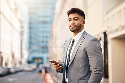 Buy stock photo Phone, portrait and business man in city online for social media, networking and website in town. Travel, professional and male worker with smartphone for internet, contact or chat on morning commute